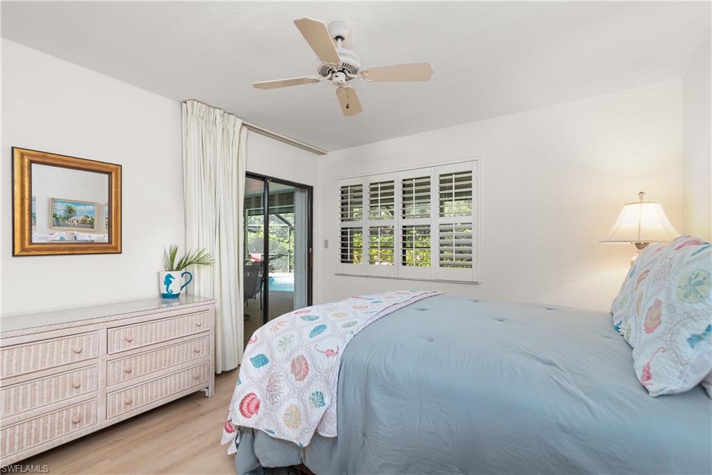 2287 Queens Way Naples, FL 34112 - Photo 16 of 21 2nd bedroom opens to the pool