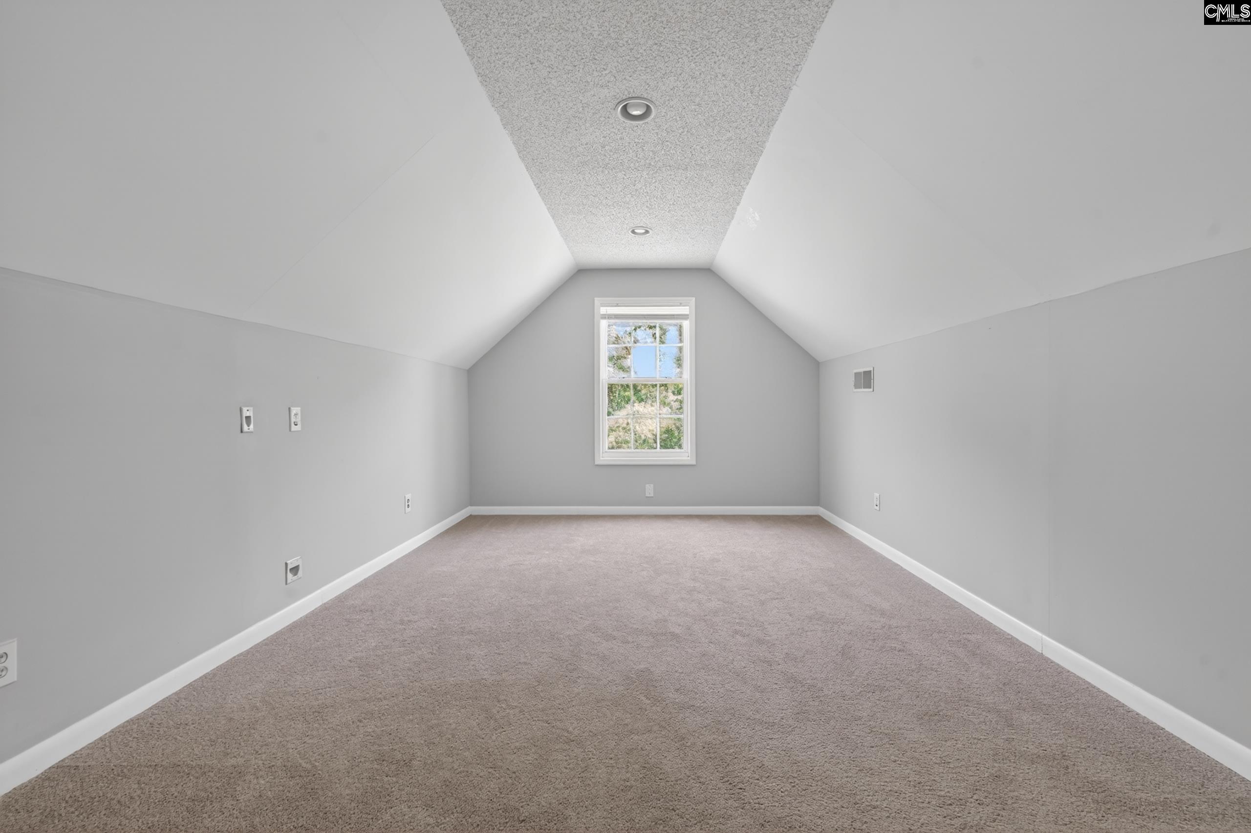 219 Plantation Pointe Drive Elgin, SC 29045 - Photo 13 of 56 an empty room with a window and closet