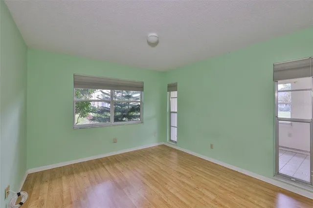 a view of a room that has a window in it