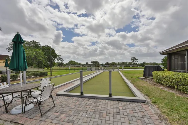 a view of a swimming pool and outdoor space
