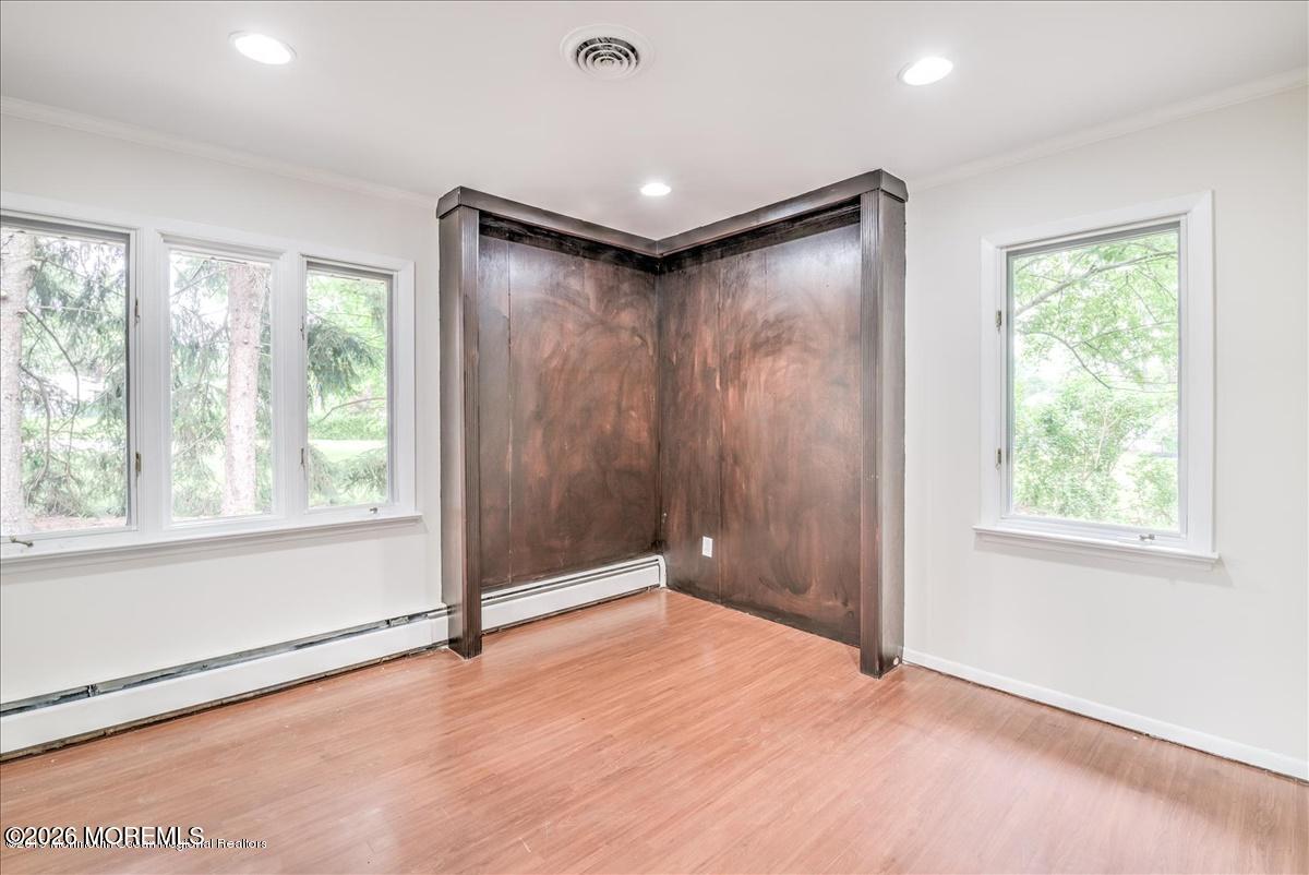 699 Aldrich Road Howell, NJ 07731 - Photo 16 of 23 an empty room with windows and closet