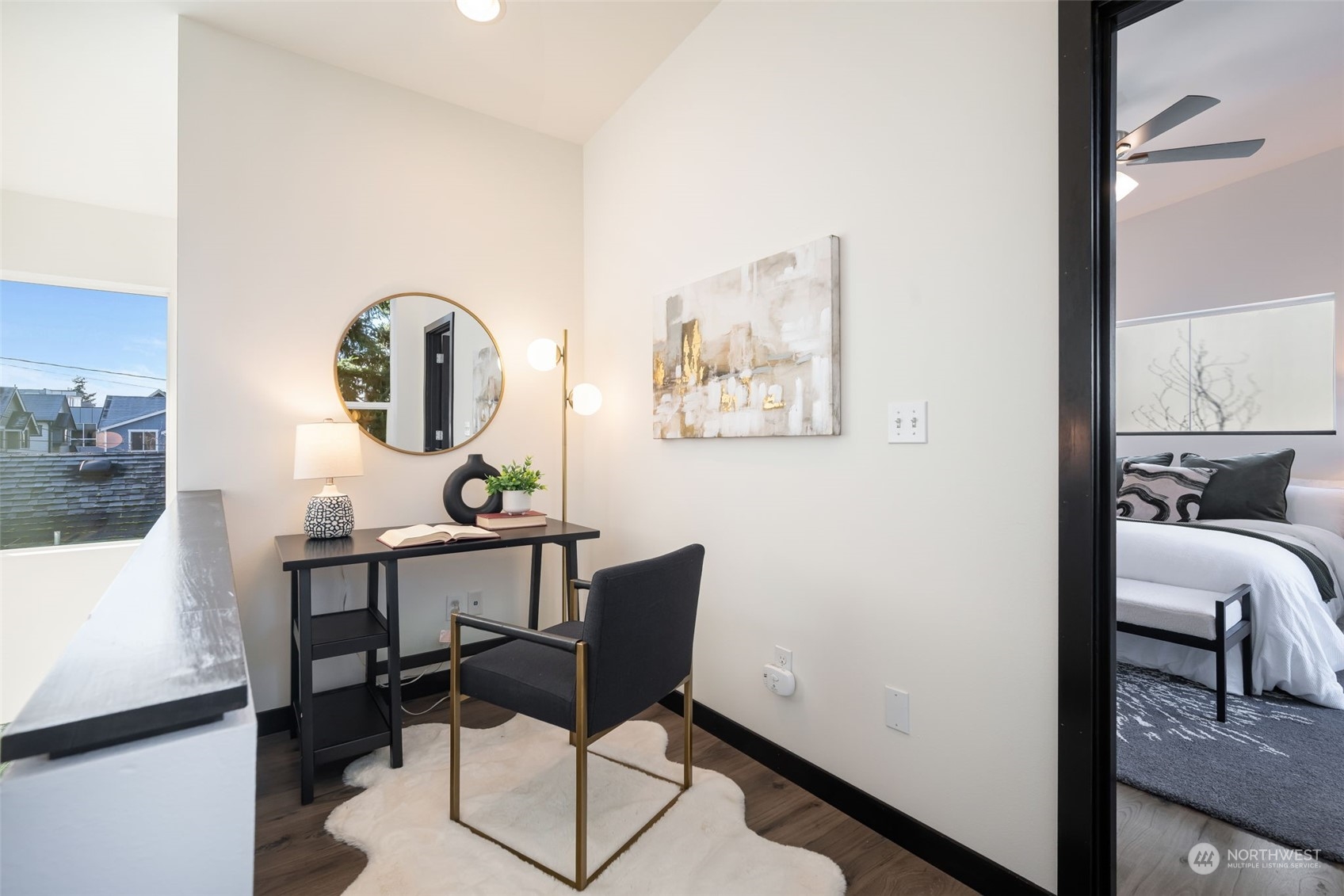 830 Northwest 53rd Street, Unit B Seattle, WA 98107 - Photo 17 of 28 a view of a workspace room with furniture and window