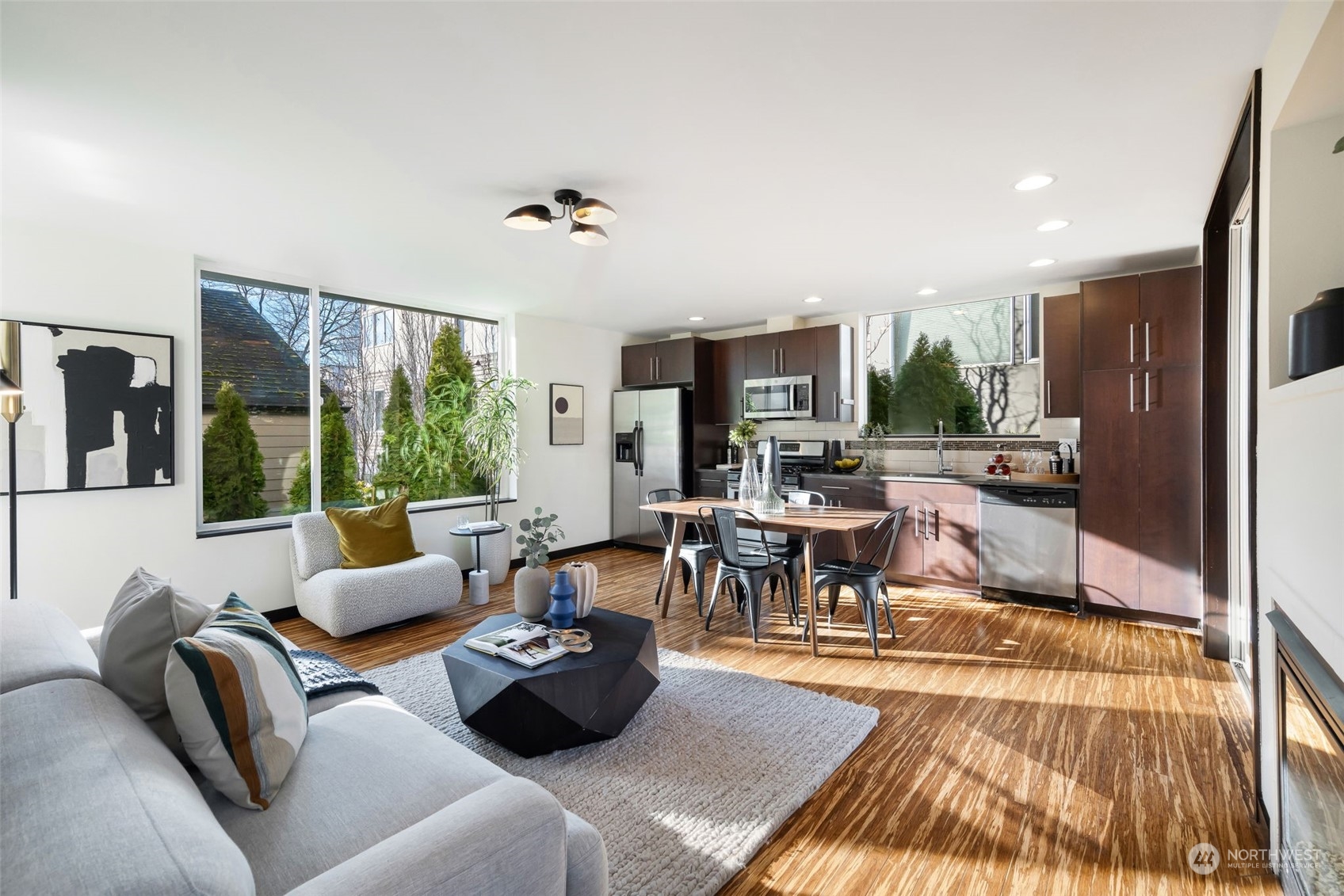 830 Northwest 53rd Street, Unit B Seattle, WA 98107 - Photo 7 of 28 a living room with furniture and a large window