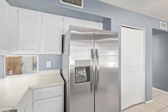 a kitchen with a sink and a window