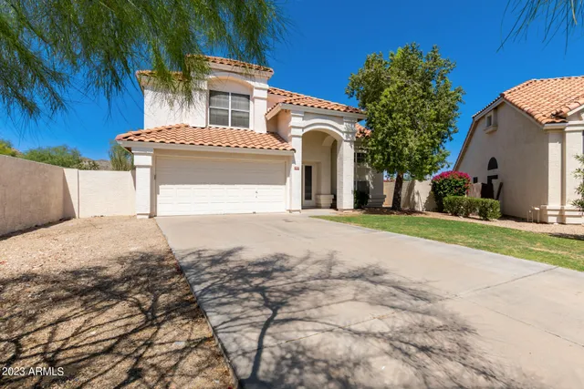a view of a house with a garden