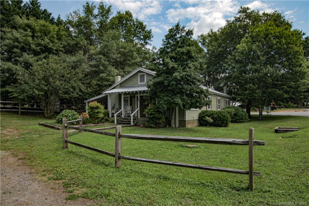 15 Big Level Road Mill Spring, NC 28756 - Photo 1 of 20 a view of a house with a yard