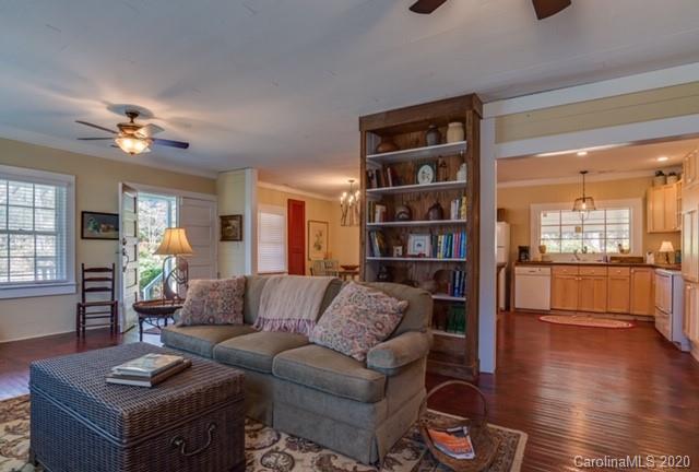 15 Big Level Road Mill Spring, NC 28756 - Photo 9 of 20 a living room with furniture and a book shelf