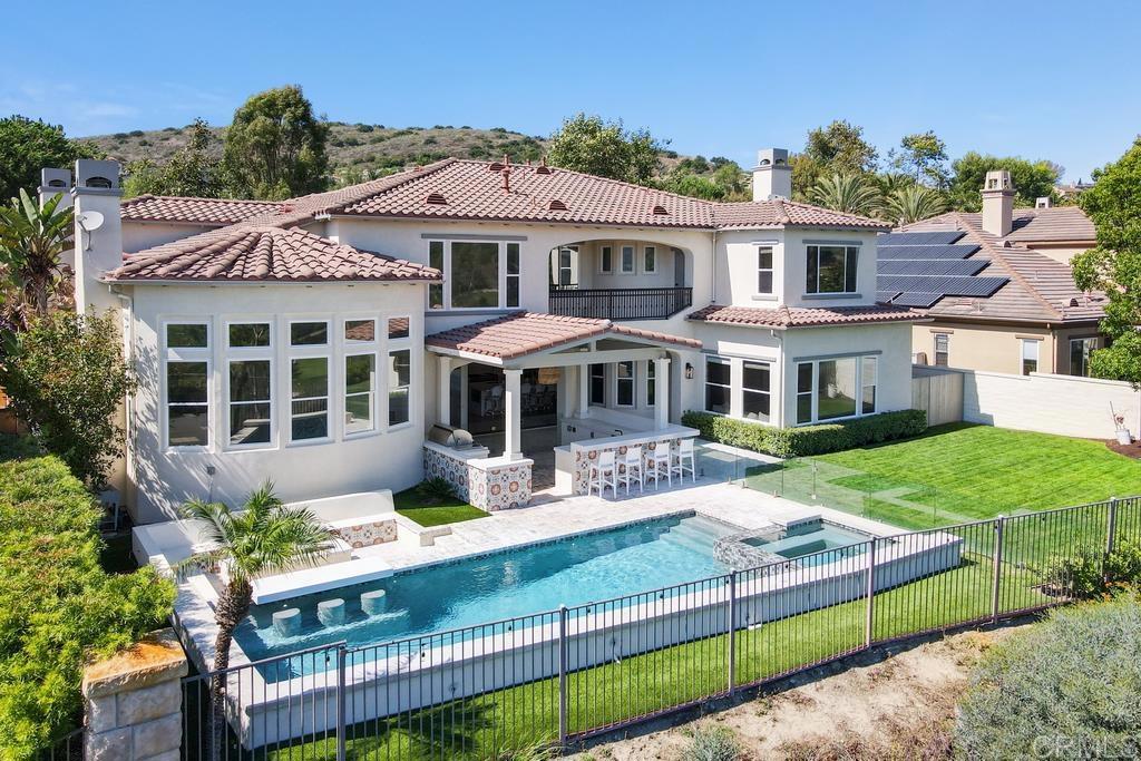 8 Corte Vizcaya San Clemente, CA 92673 - Photo 1 of 62 a front view of a house with a yard table and chairs