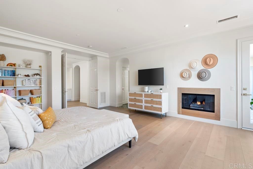 8 Corte Vizcaya San Clemente, CA 92673 - Photo 29 of 62 a spacious bedroom with a bed and a flat screen tv