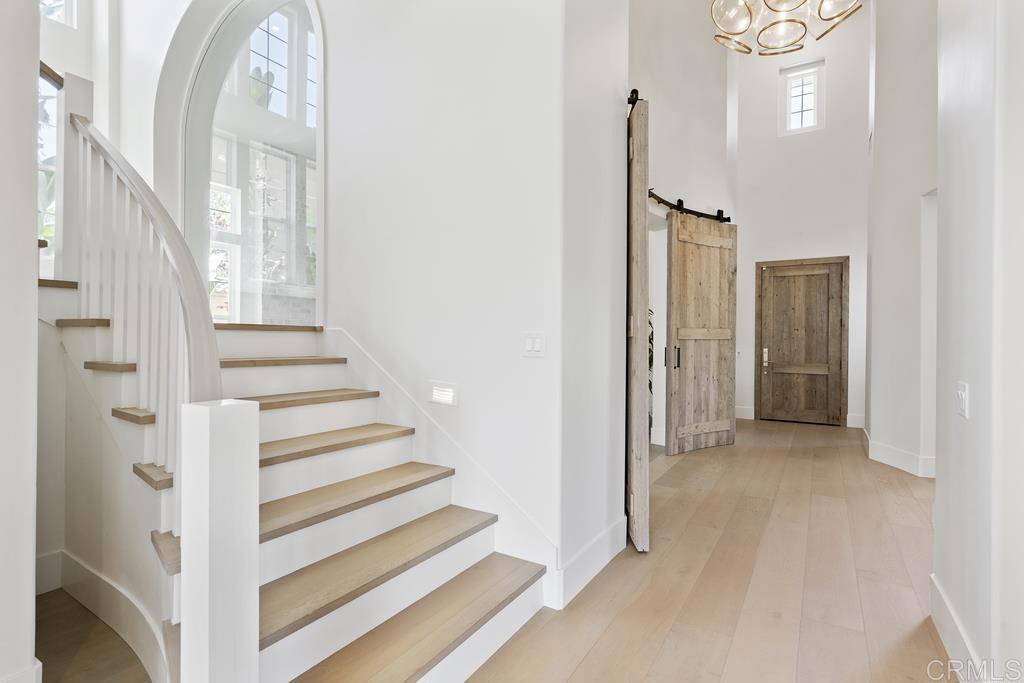 8 Corte Vizcaya San Clemente, CA 92673 - Photo 4 of 62 a view of a livingroom with wooden floor and entryway