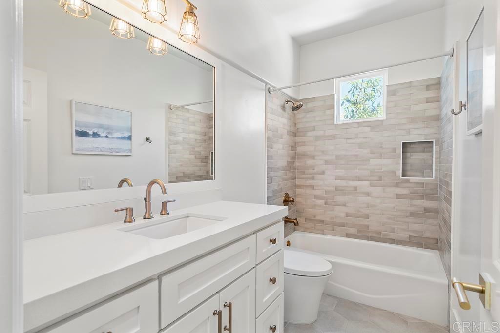 8 Corte Vizcaya San Clemente, CA 92673 - Photo 47 of 62 a bathroom with a sink a toilet and shower