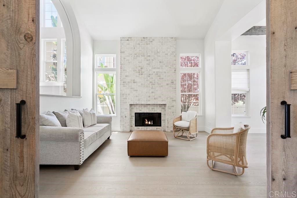 8 Corte Vizcaya San Clemente, CA 92673 - Photo 5 of 62 a living room with furniture and a fireplace