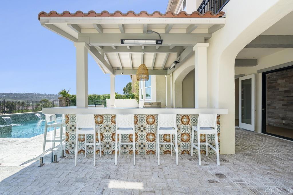 8 Corte Vizcaya San Clemente, CA 92673 - Photo 55 of 62 a view of a dining room with furniture and a floor to ceiling window