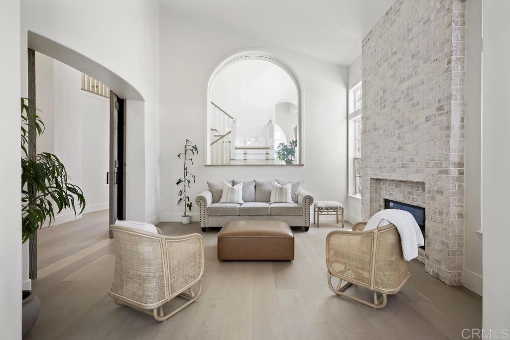 8 Corte Vizcaya San Clemente, CA 92673 - Photo 7 of 62 a living room with furniture and a fireplace