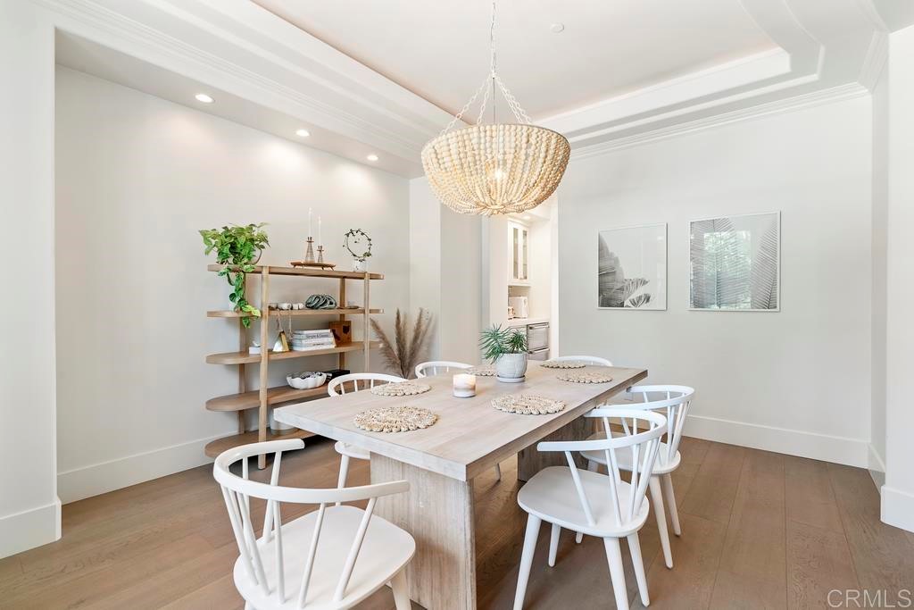 8 Corte Vizcaya San Clemente, CA 92673 - Photo 10 of 62 a view of a dining room with furniture wooden floor and chandelier