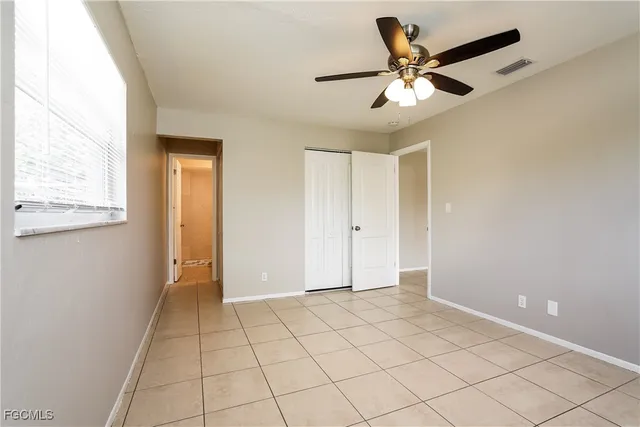a view of an empty room and window