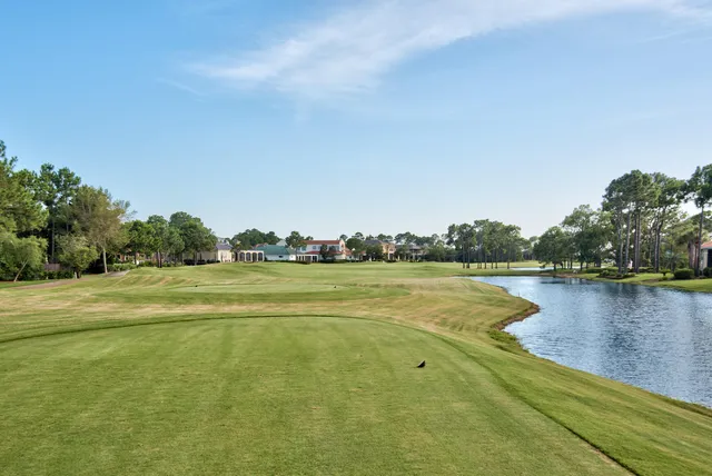 a view of a city and lake from a balcony