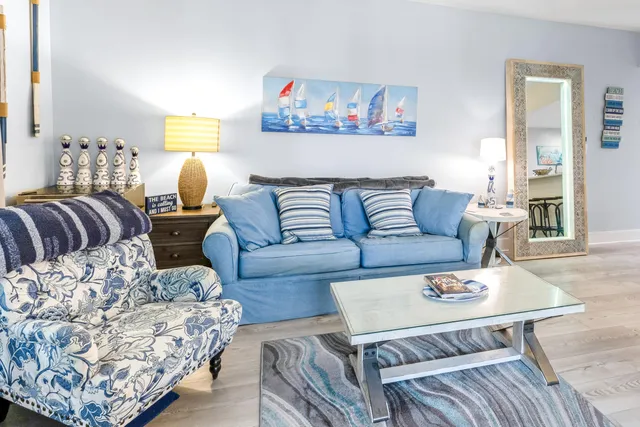 a living room with furniture and a couch