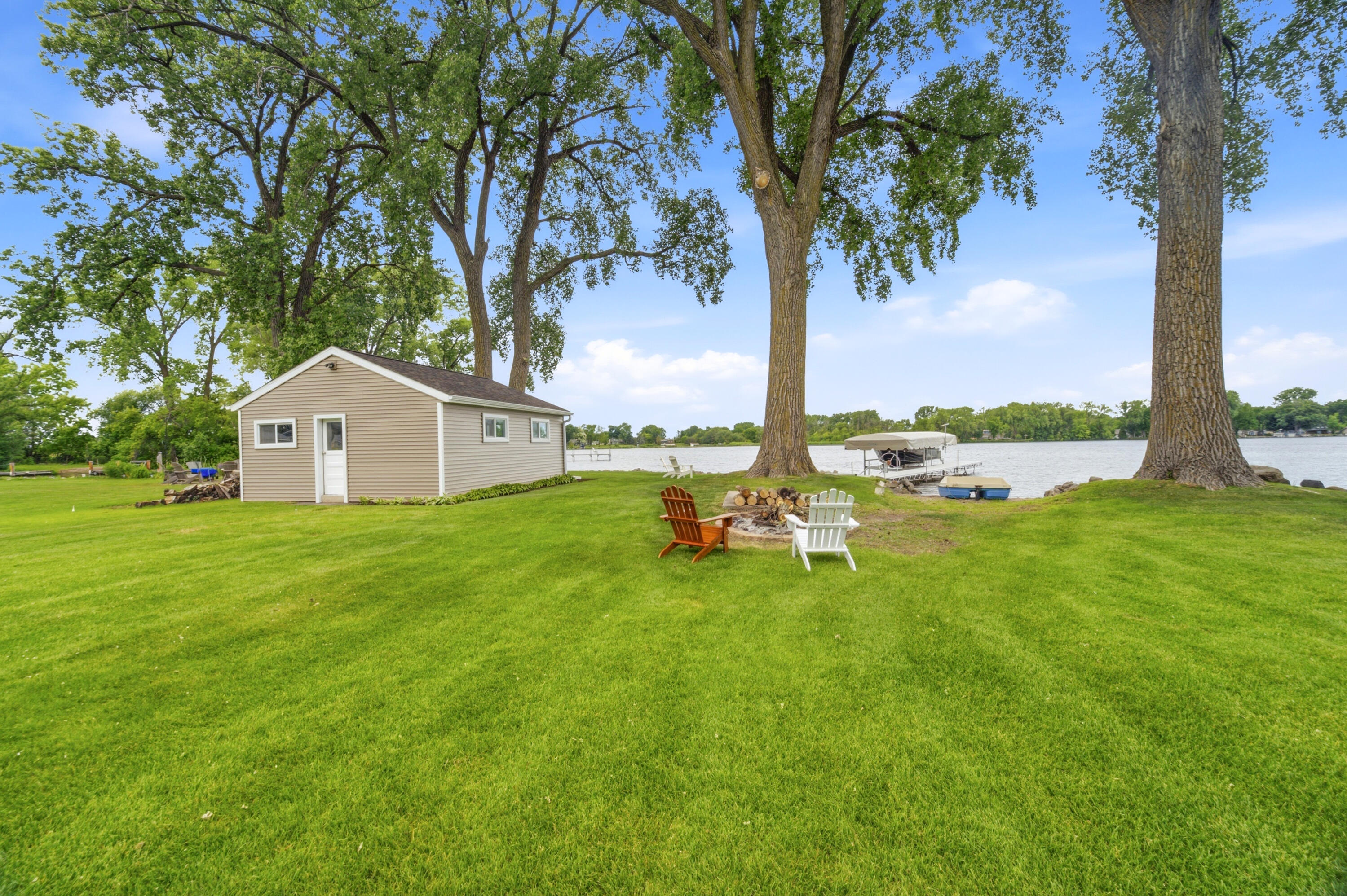 6121 Black Wolf Point Road Black Wolf, WI 54902 - Photo 48 of 85 Water View with Boat House