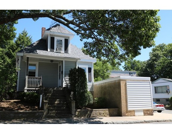 126 Fulton Spring Road Medford, MA 02155 - Photo 1 of 20 a view of a house with a backyard