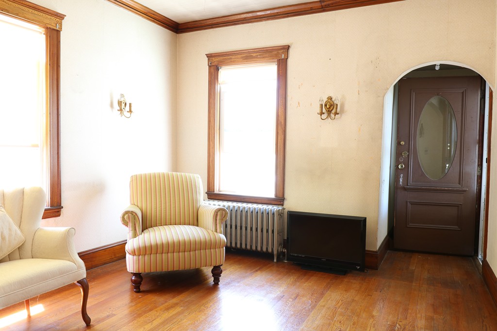 126 Fulton Spring Road Medford, MA 02155 - Photo 5 of 20 a living room with furniture and a window