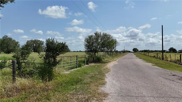 a view of a lake with a big yard