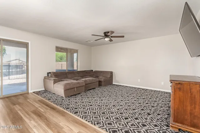a living room with a couch and a table