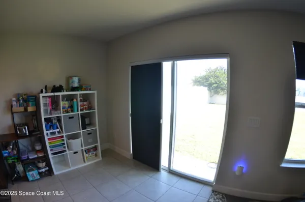 a room with furniture and a window