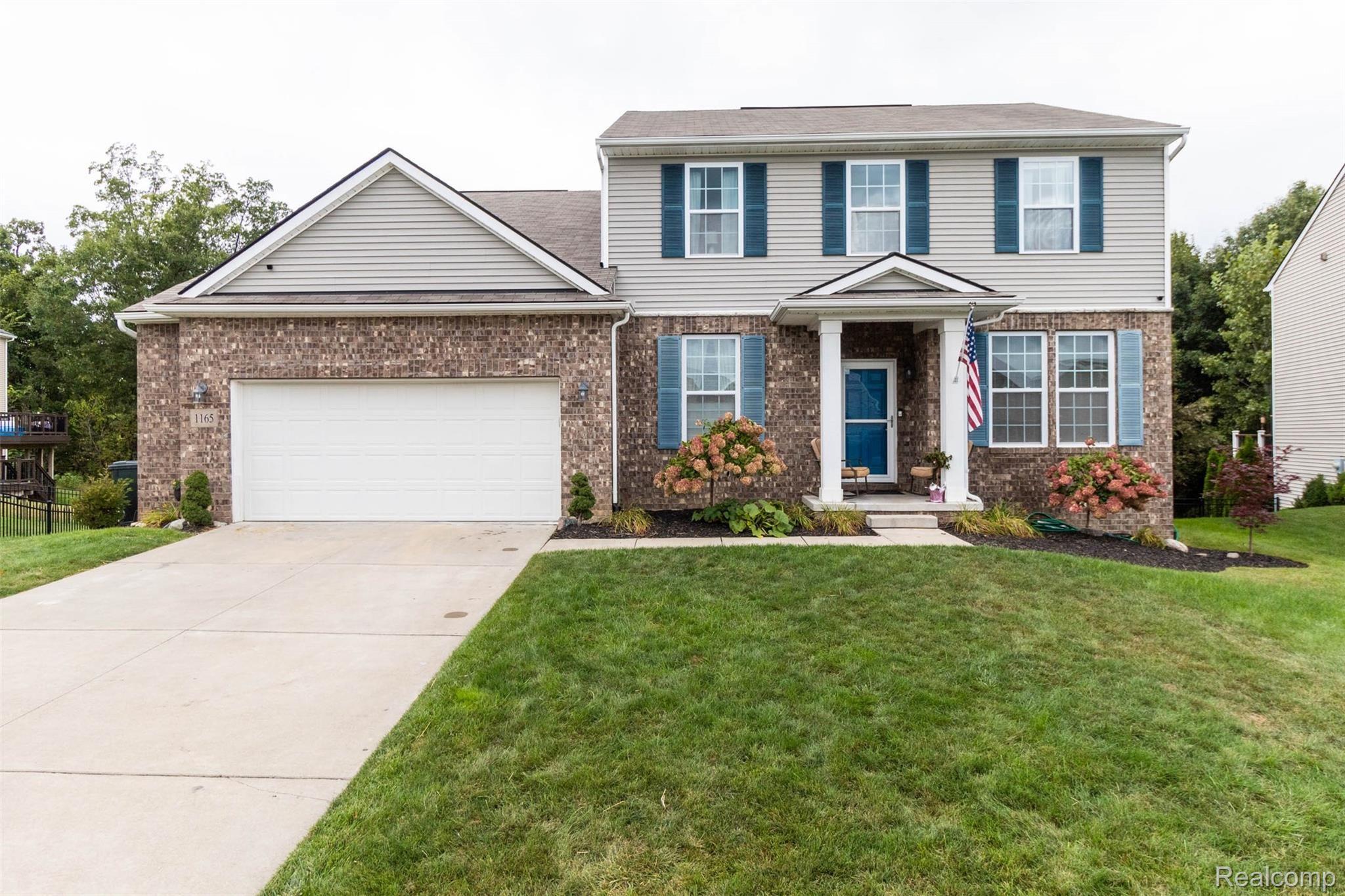 1165 Risen Star Way Howell, MI 48843 - Photo 1 of 47 Front of the home