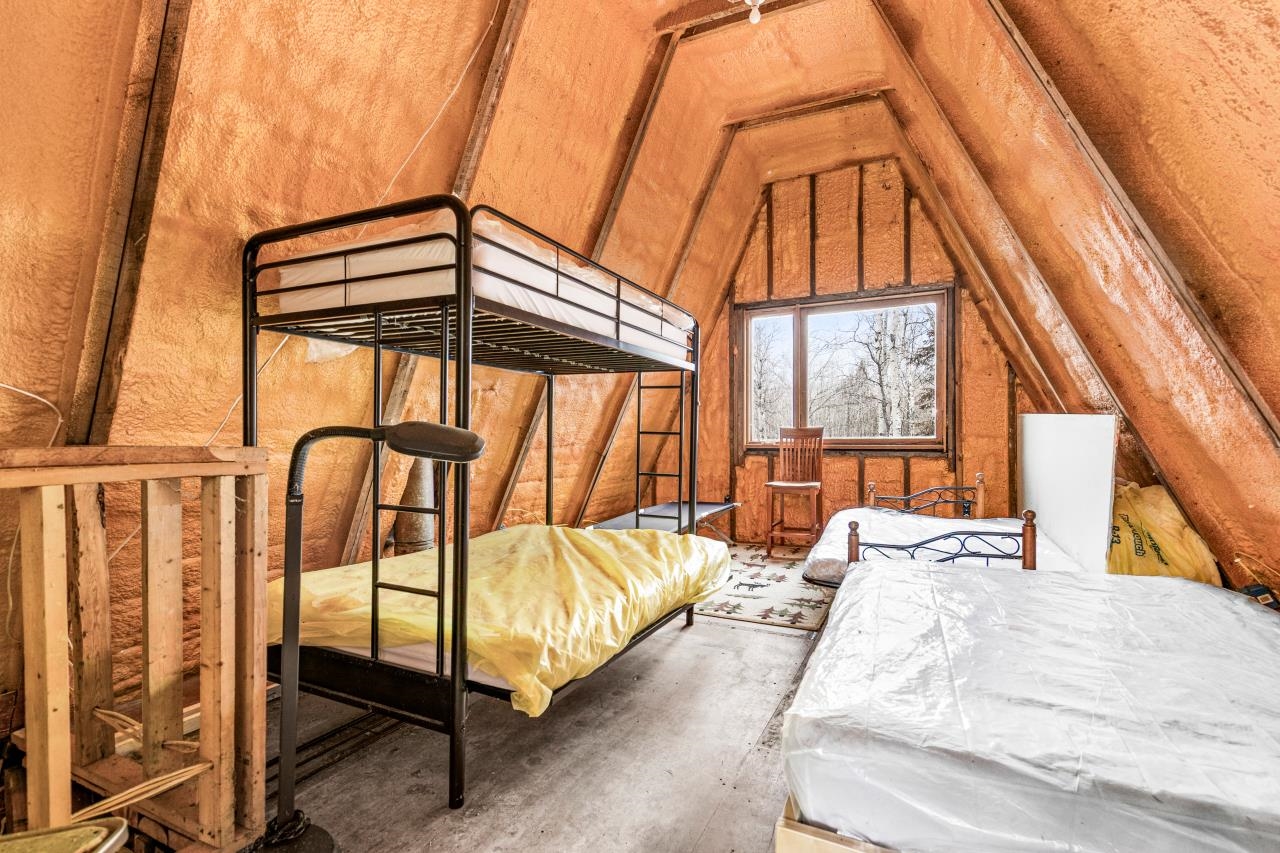 2040 Green Acres Road Maple, WI 54854 - Photo 15 of 19 Bedroom with lofted ceiling