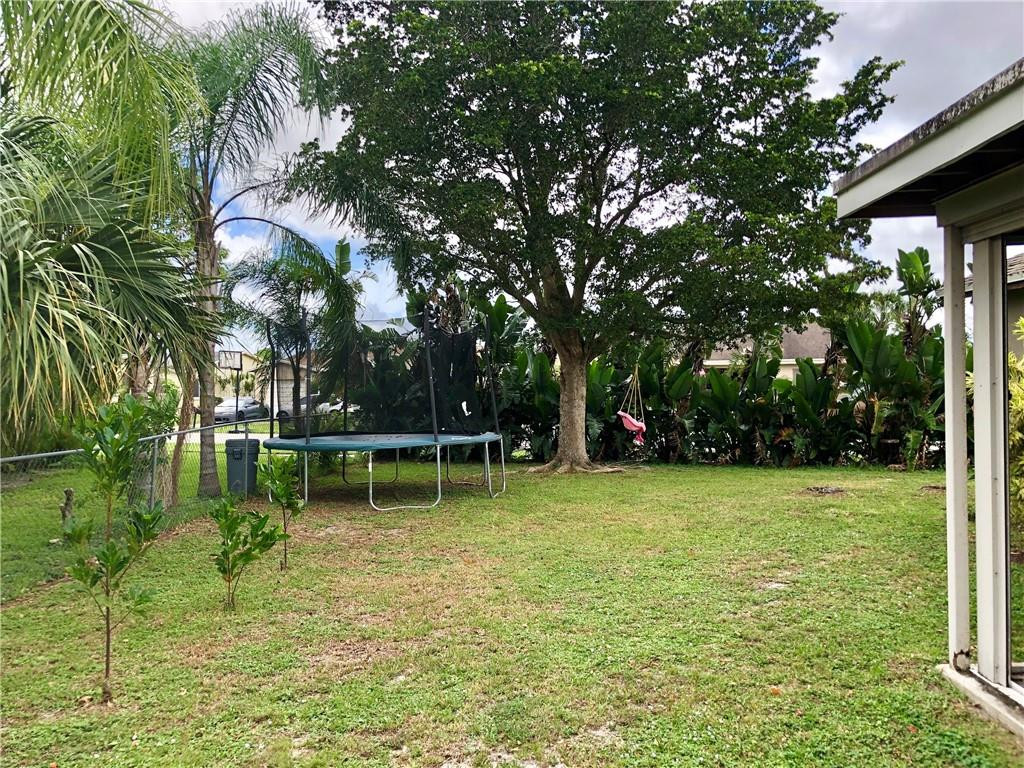 9171 Southwest 18th Road Boca Raton, FL 33428 - Photo 12 of 22 LARGE FENCED BACK YARD WITH STORAGE BARN