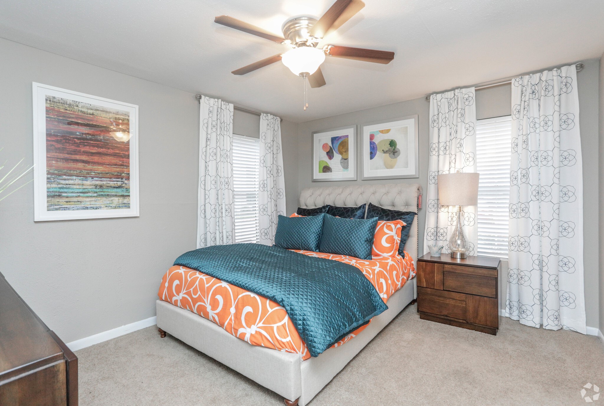 10250 Lands End Drive, Unit 1010 Houston, TX 77099 - Photo 14 of 27 a bedroom with a bed and a chandelier
