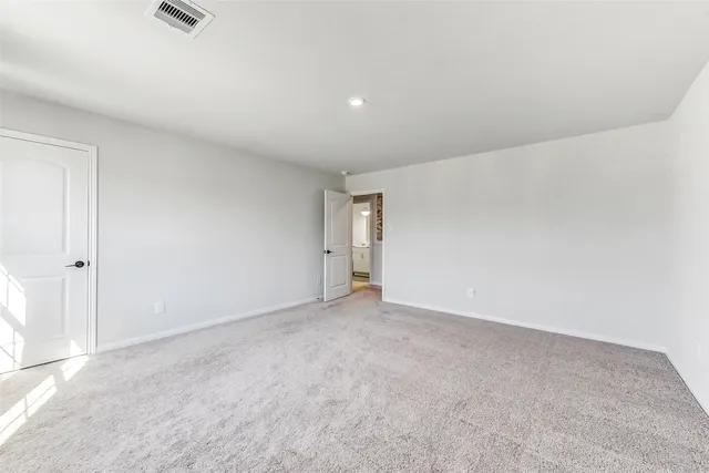 an empty room with an entryway