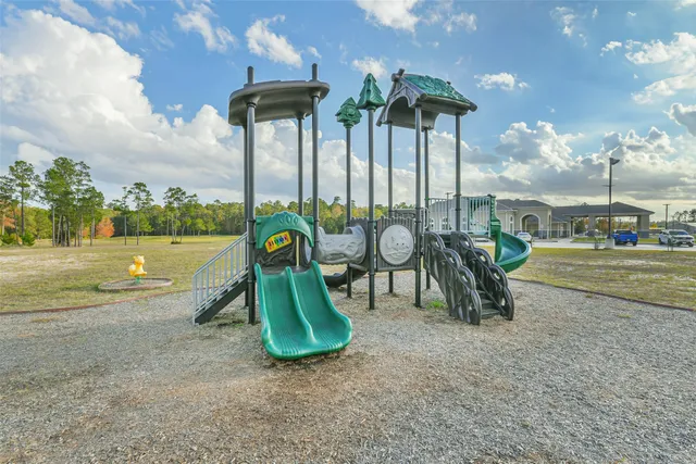 a view of a park with slide