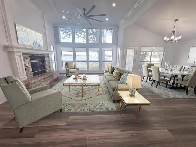 a living room with furniture or fireplace and a table