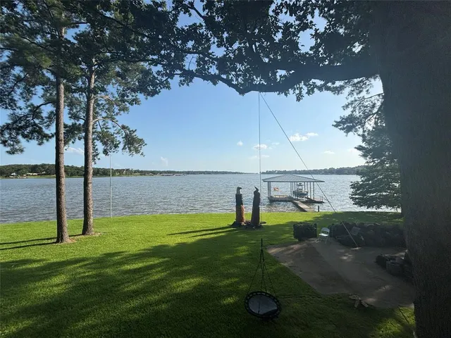 a view of a golf course with a lake