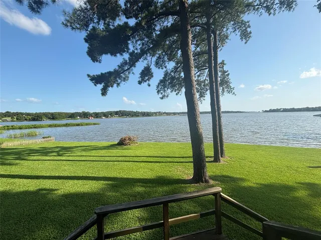a view of a lake with a beach