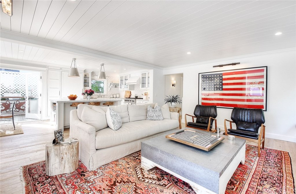 564 Oak Street Laguna Beach, CA 92651 - Photo 12 of 34 Family room with beautiful beamed ceilings looking towards the kitchen, with the hall way leading to bedrooms.