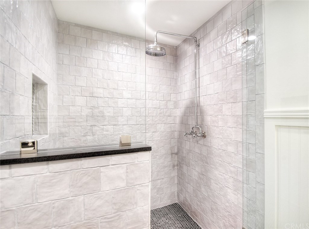 564 Oak Street Laguna Beach, CA 92651 - Photo 27 of 34 Bonus room bath walk-in shower finished with glass tile.