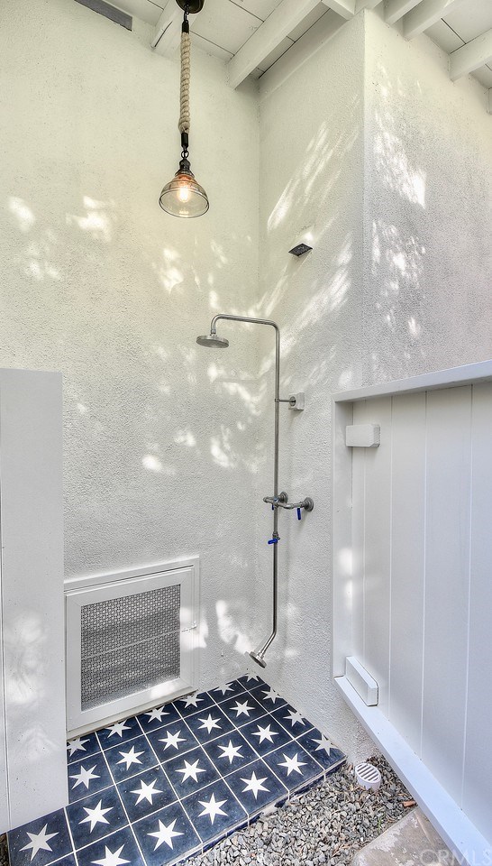 564 Oak Street Laguna Beach, CA 92651 - Photo 33 of 34 Outdoor shower with handmade tile is perfect for your return home from nearby beaches.