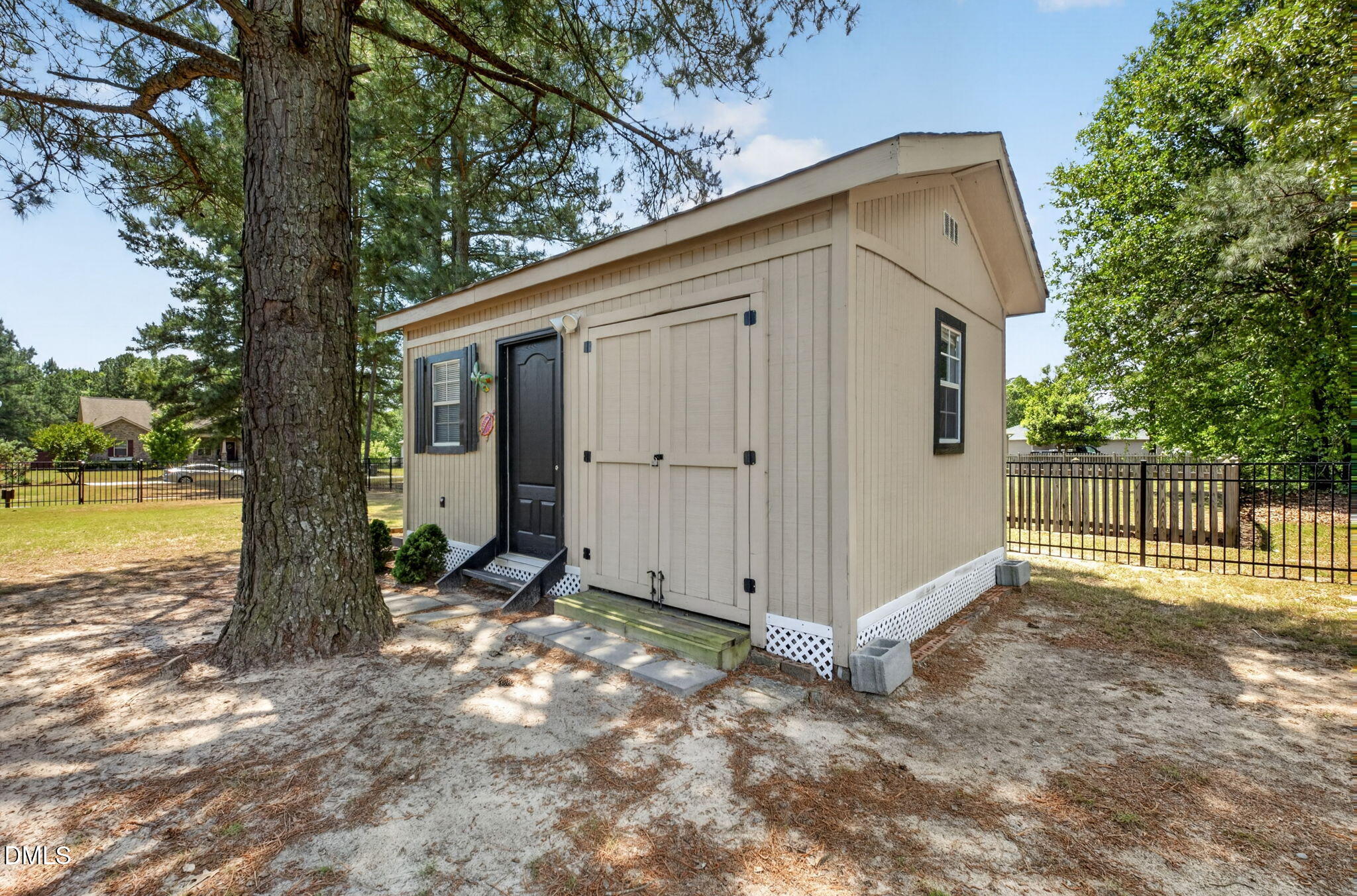 20 Deep Clay Circle Angier, NC 27501 - Photo 51 of 54 a view of a small house with a tree in the background