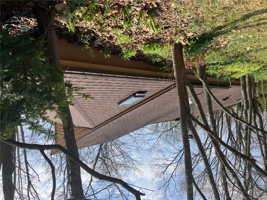 2066 Tolbert Road Hamilton, OH 45011 - Photo 39 of 63 This charming home offers a classic roofline and skylights amidst a tranquil, treed setting.