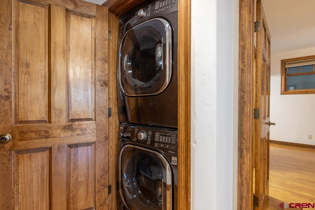 355 East 3rd Avenue, Unit 112 Durango, CO 81301 - Photo 12 of 27 a view of a hallway with washer and dryer