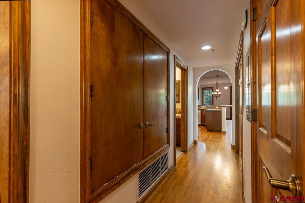 355 East 3rd Avenue, Unit 112 Durango, CO 81301 - Photo 19 of 27 a view of a hallway with wooden floor
