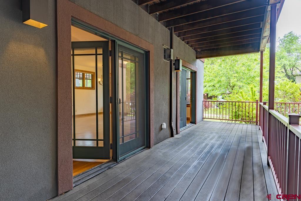 355 East 3rd Avenue, Unit 112 Durango, CO 81301 - Photo 20 of 27 a view of a porch with wooden floor and outer view