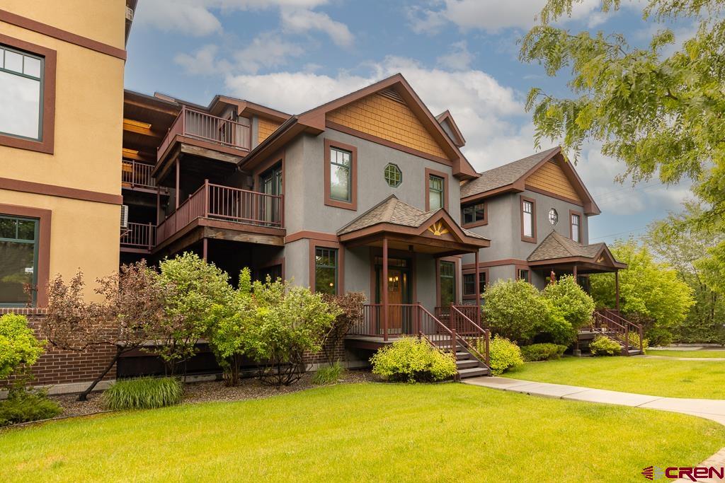 355 East 3rd Avenue, Unit 112 Durango, CO 81301 - Photo 24 of 27 front view of a house with a yard