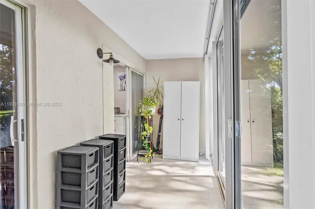 a view of a hallway with elevator