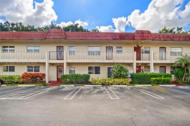a front view of multi story residential apartment building