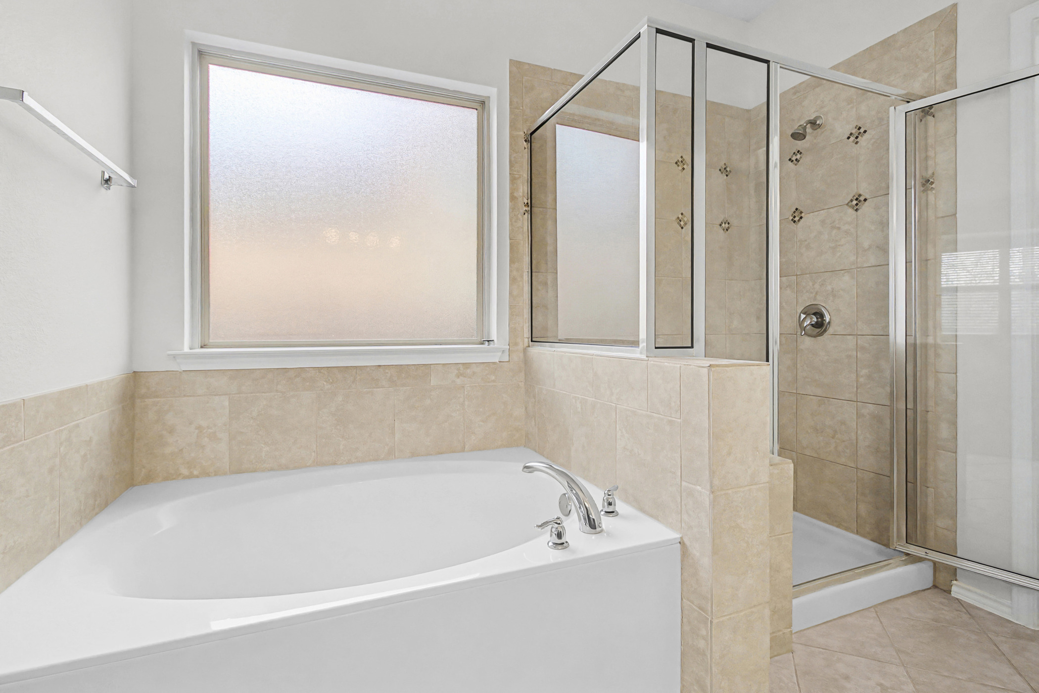 501 Silver Trail Round Rock, TX 78664 - Photo 13 of 22 a white bath tub sitting next to a shower