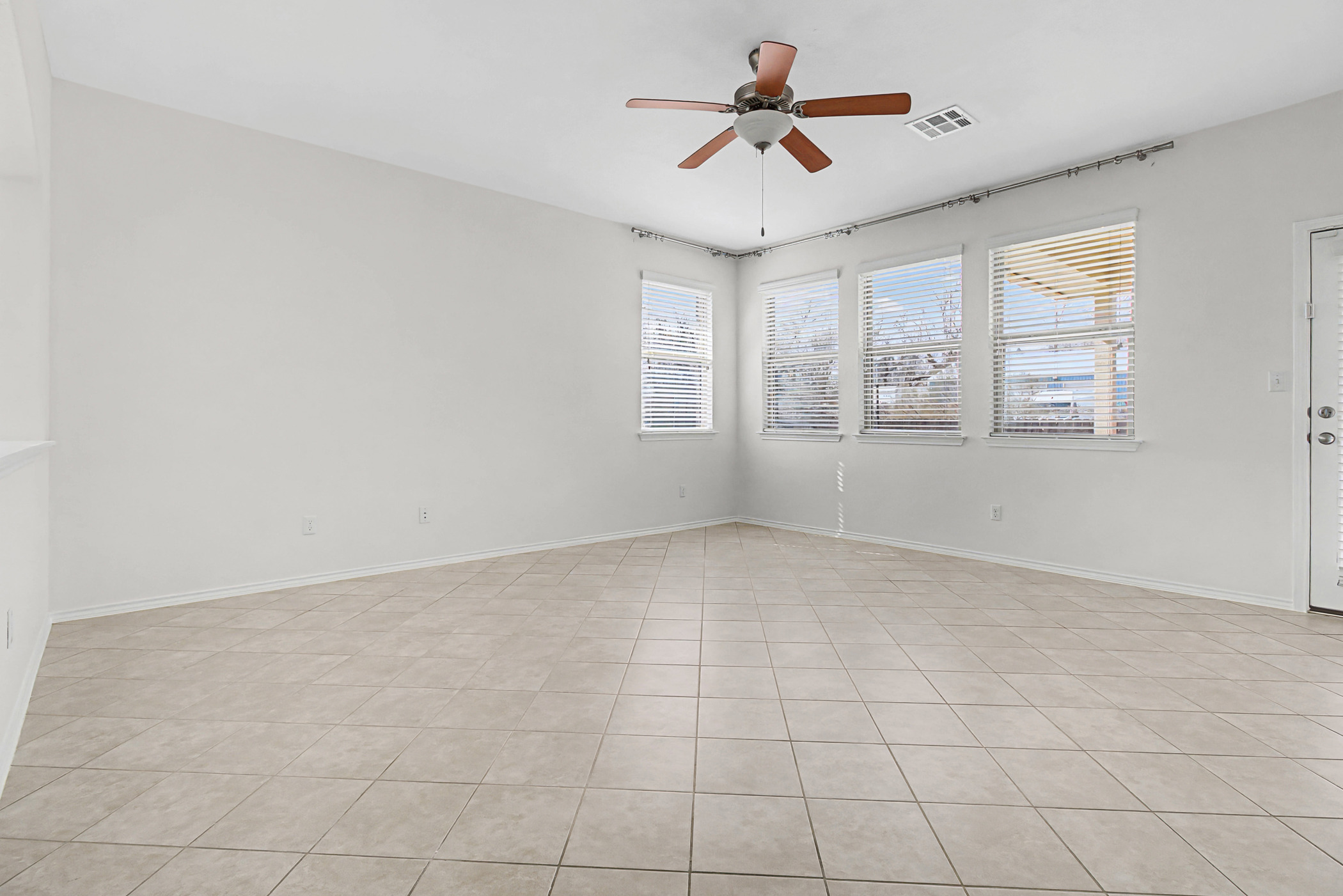 501 Silver Trail Round Rock, TX 78664 - Photo 7 of 22 a view of an empty room with a window